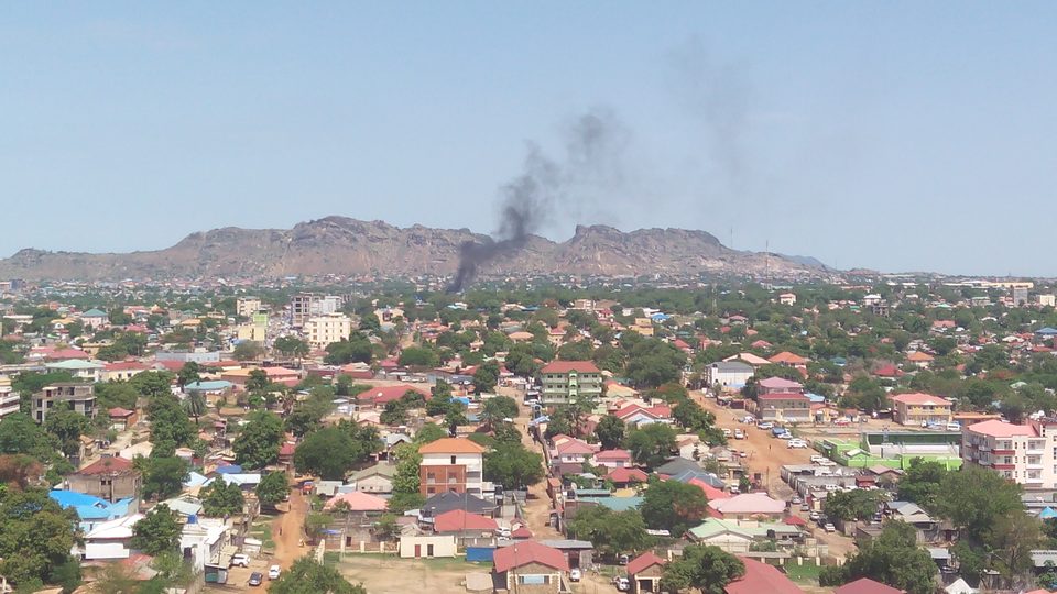 View over the rooftops of Juba, South Sudan, with hills in the distance