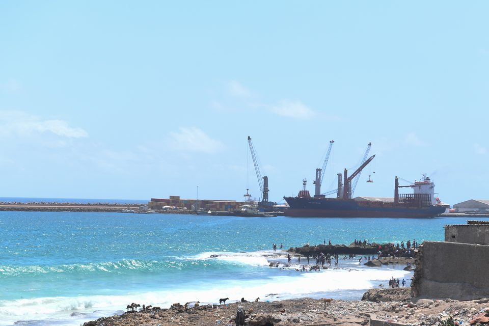 Ships at the sea port in Mogadishu, seen from the shore
